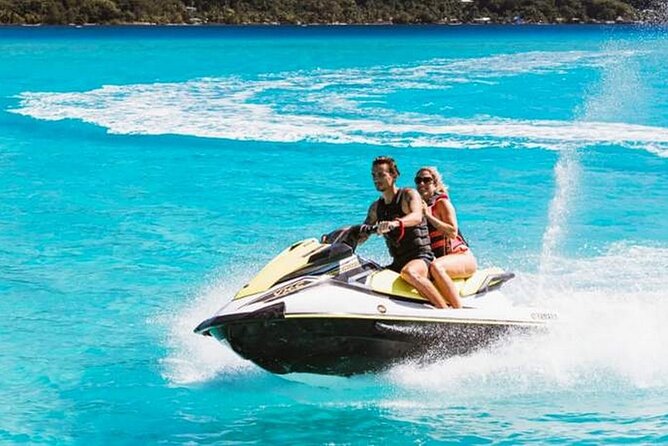 Combo snorkeling + motu lunch + jet ski group tour full day - Swimming near sharks with a guide