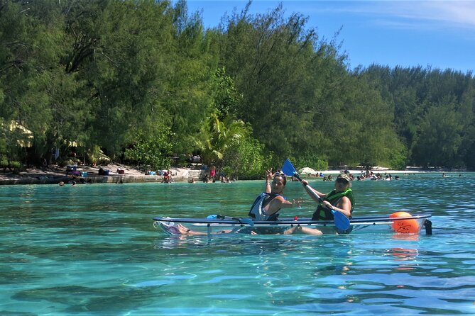 Eco guided excursion to the lagoon of Moorea in transparent kayak 1/2 day morning - Snorkeling and the sandbank fruit break