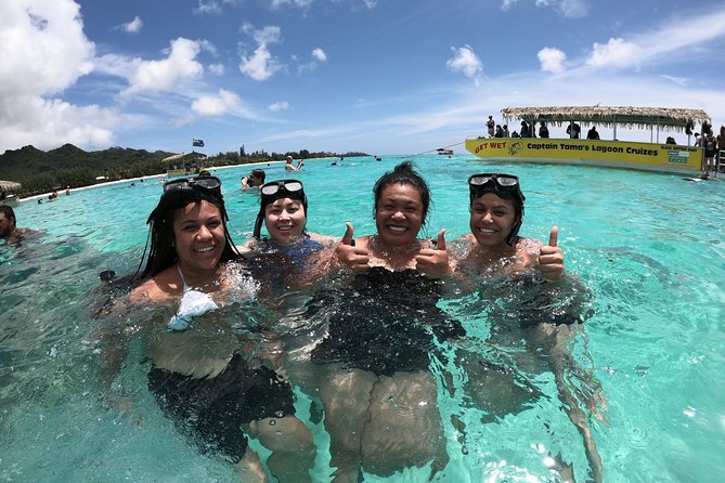 Half-Day Muri Lagoon BBQ Lunch Cruise including Snorkeling - Captain Tama’s crew supplies the songs and jokes