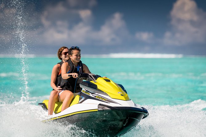 Island jet tour - The motu stop: swim, fruit, and coconut