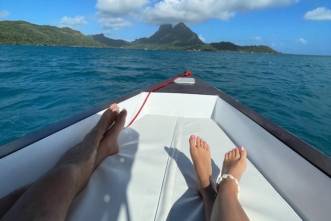 Private sunset cruise in Bora Bora - The first toast and the slow cruise through the lagoon